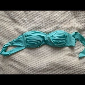 Turquoise blue bikini top. Ties in the back.